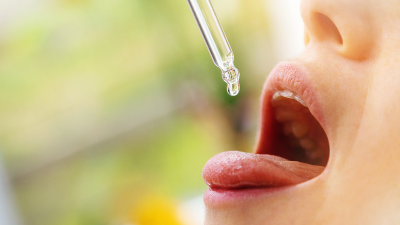 Women taking CBD oil