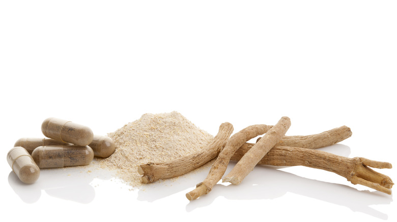 Ashwagandha roots and capsules