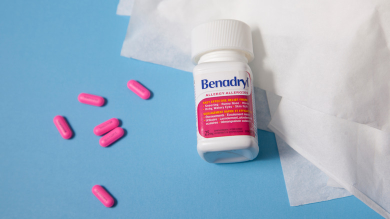 A bottle of Benadryl on a table