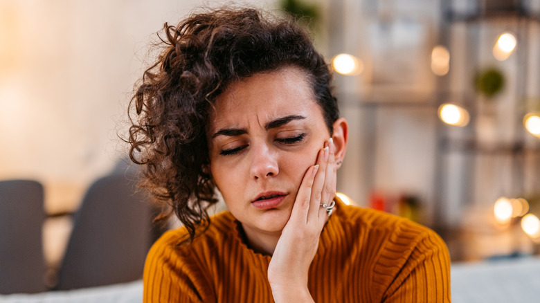 Woman with tooth pain