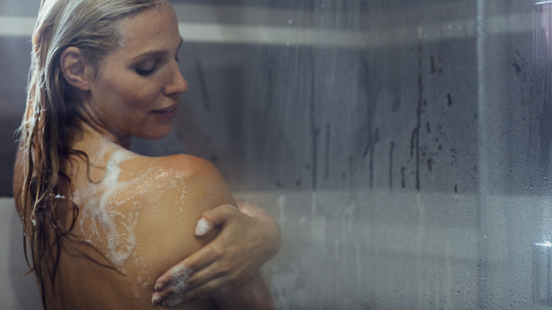 Woman using body wash