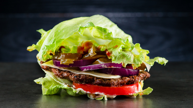 A burger wrapped in lettuce