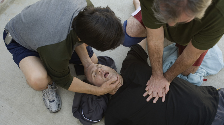 people practicing CPR