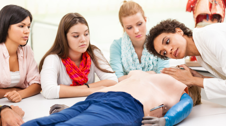 cpr practice with dummy