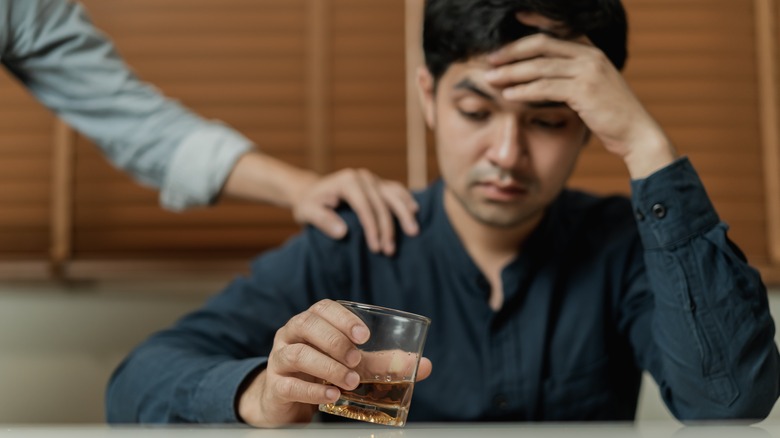 man drinking beer