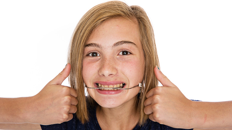 Girl wearing headgear