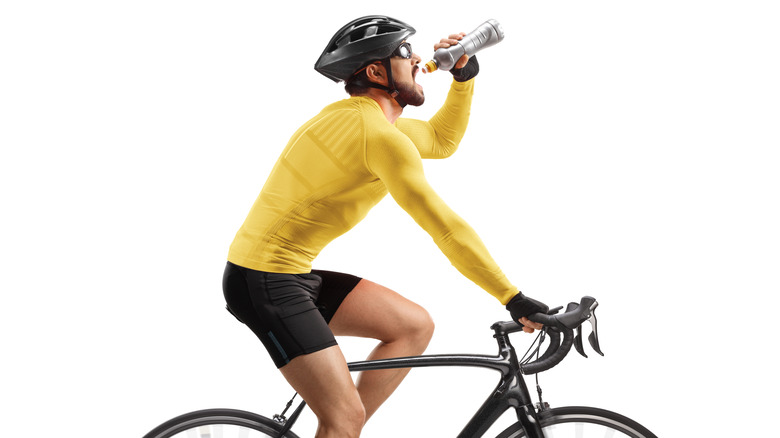 cyclist drinking water