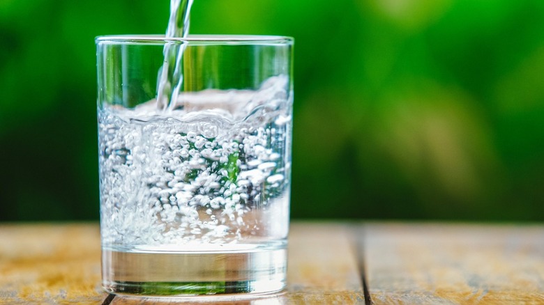 pouring seltzer water