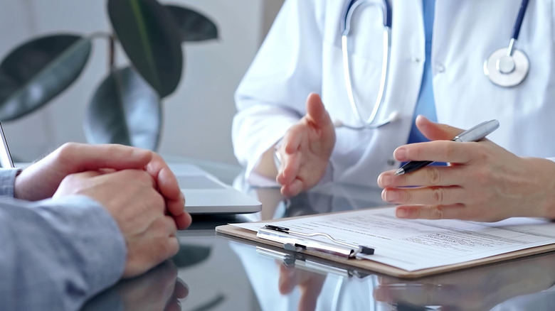 a patient consulting a doctor