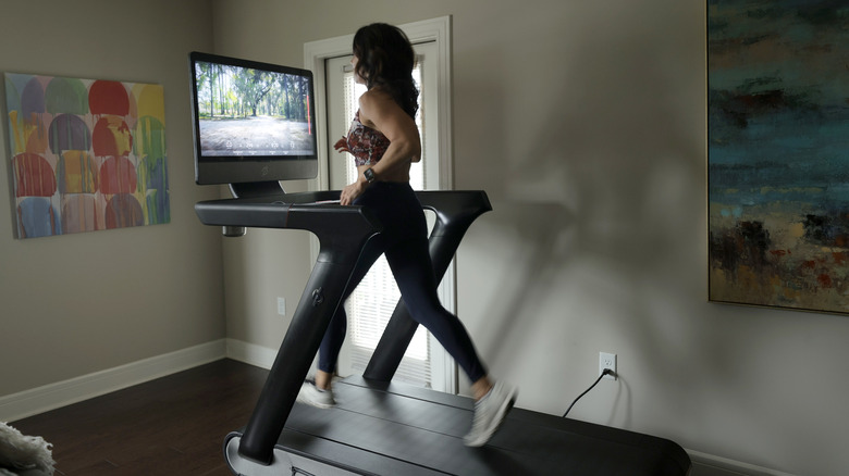 woman running on treadmill 