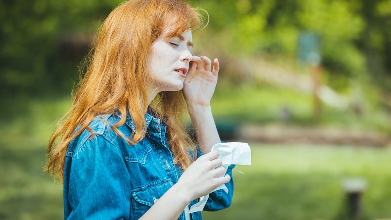 A woman managing allergies