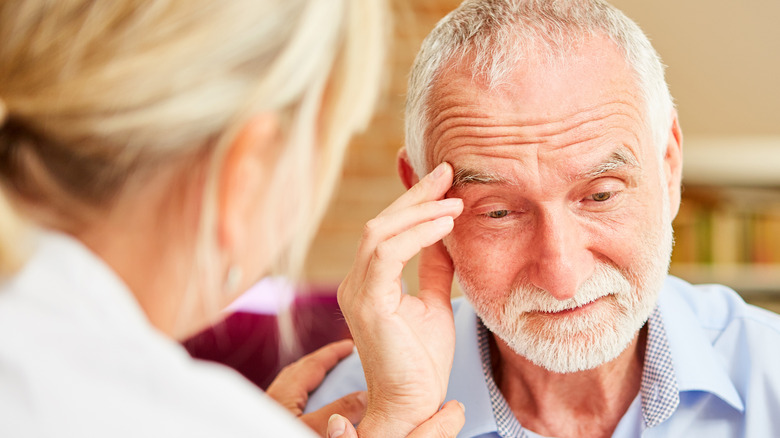 Man with dementia at doctor