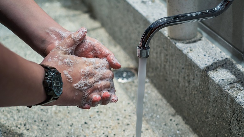 Person washing hands
