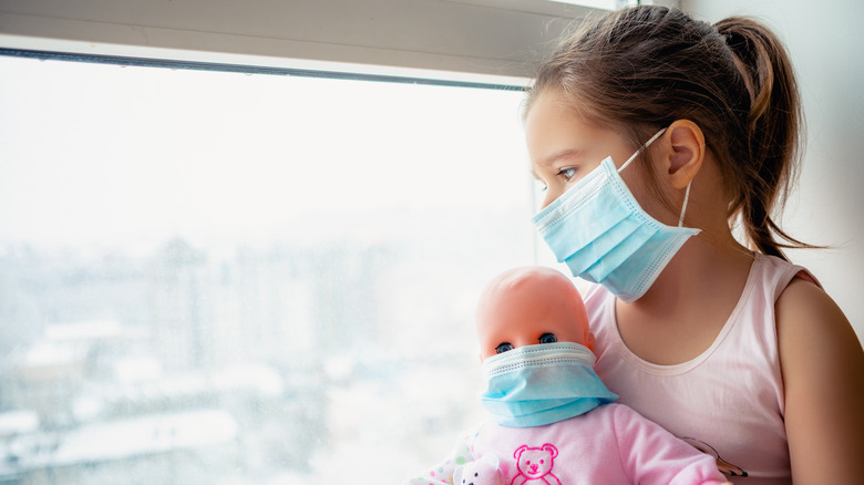 Child looking at air pollution