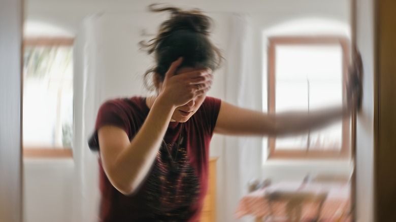 Woman feeling dizzy