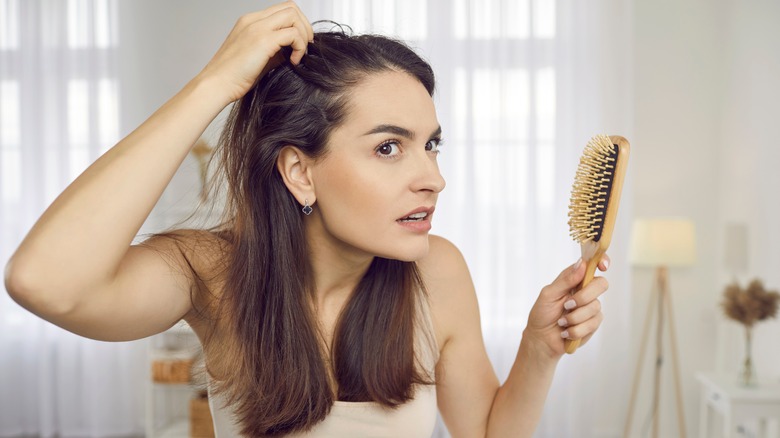 woman losing hair