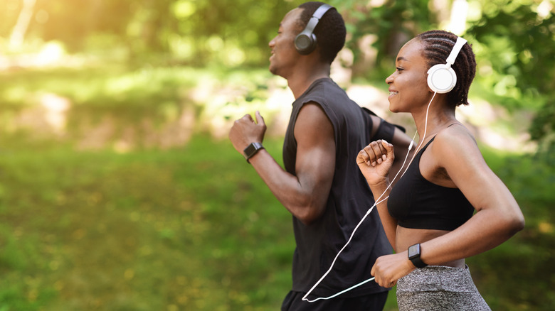 man and woman running