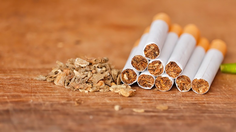cigarettes on wooden table