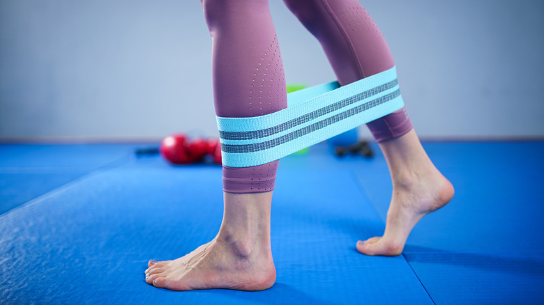 a woman working out barefoot