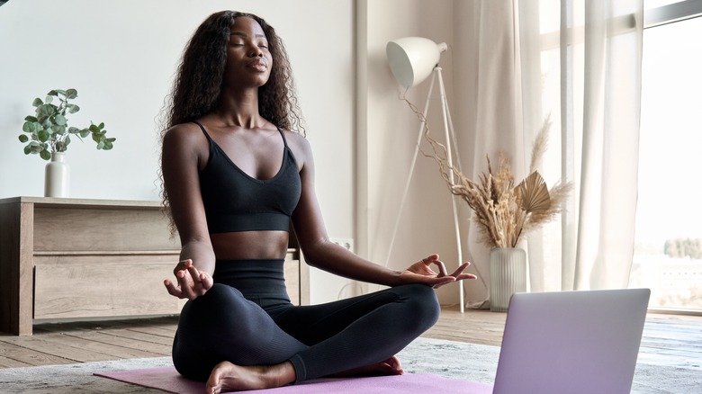 woman doing breathing exercises