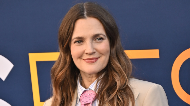 Drew Barrymore smiling during a red carpet event