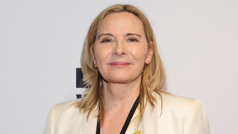 Kim Cattrall posing at a publicity event