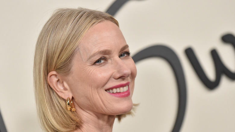 Naomi Watts smiling for the cameras during a publicity event