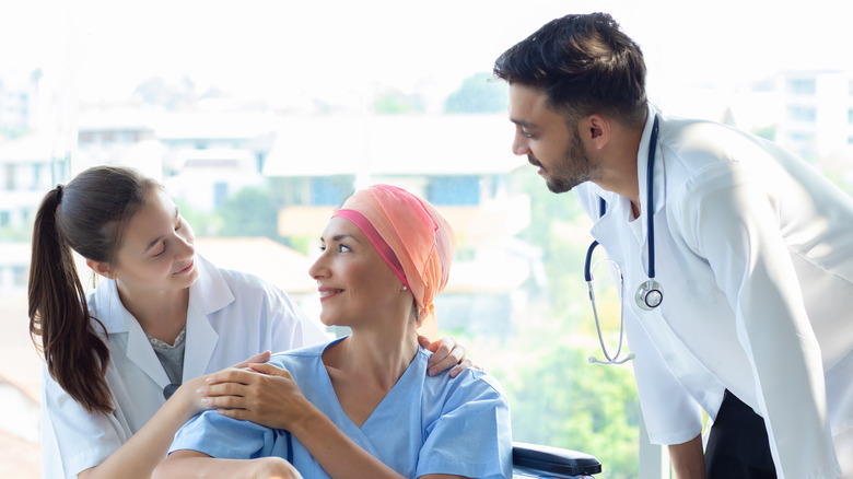 A woman undergoes chemotherapy treatments