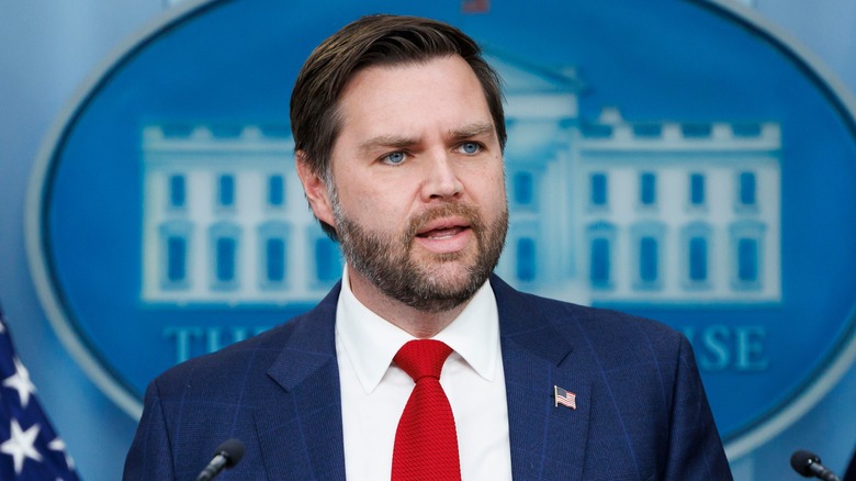 Vice President JD Vance at a White House podium in 2025