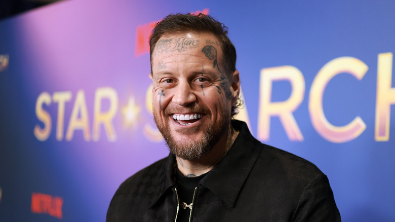 Jelly Roll smiling at a celebrity event