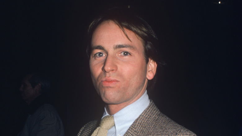 John Ritter posing in a suit