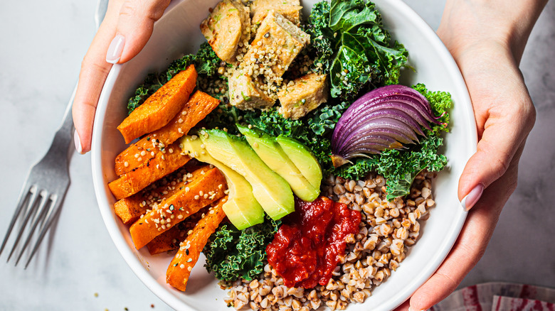 close up of bowl of vegetables and grains