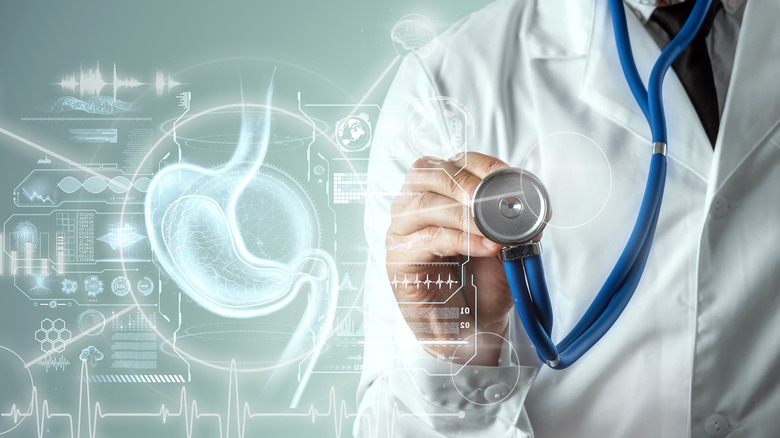 stomach with stethoscope