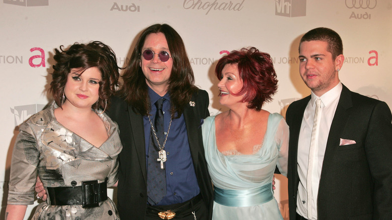 Kelly, Ozzy, Sharon, and Jack Osbourne on the red carpet