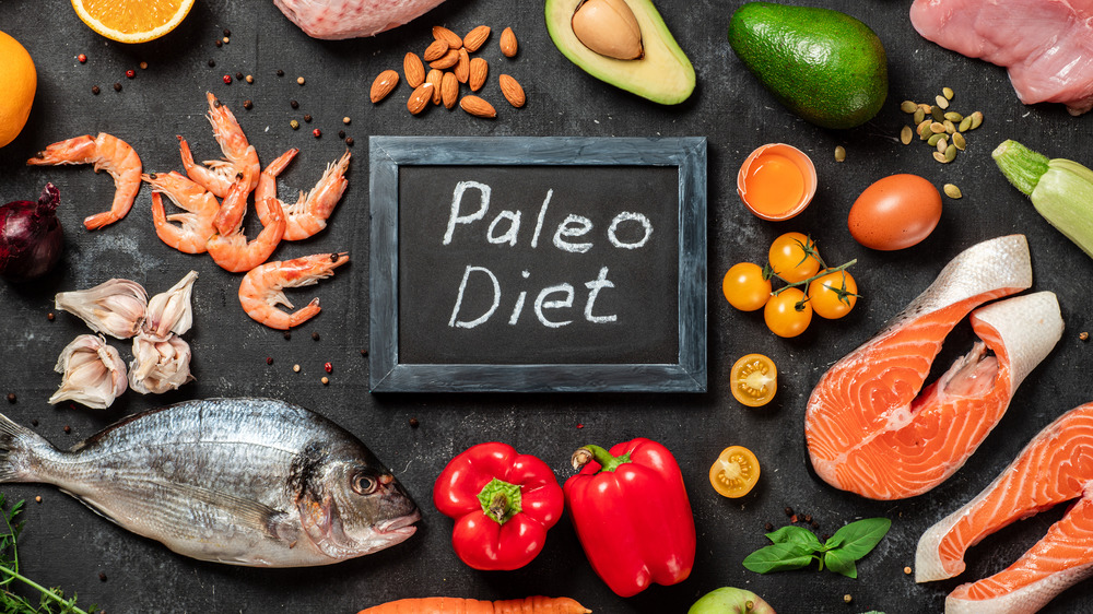 Foods allowed on the paleo diet shown with a sign