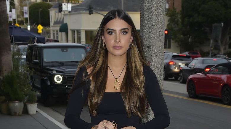 Sophia Umansky with a serious expression walking down LA in 2023