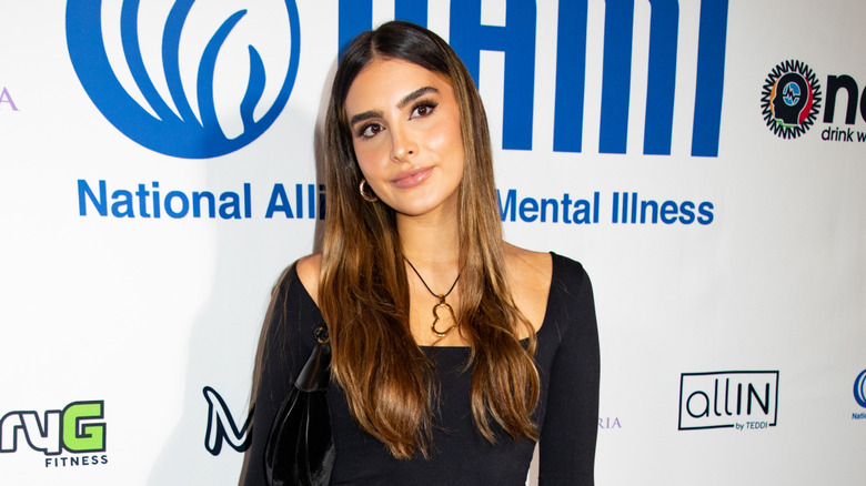 Sophia Umansky posing for photos at a charity event