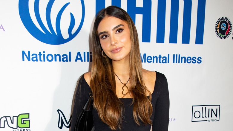 Sophia Umansky posing for photos at a charity event