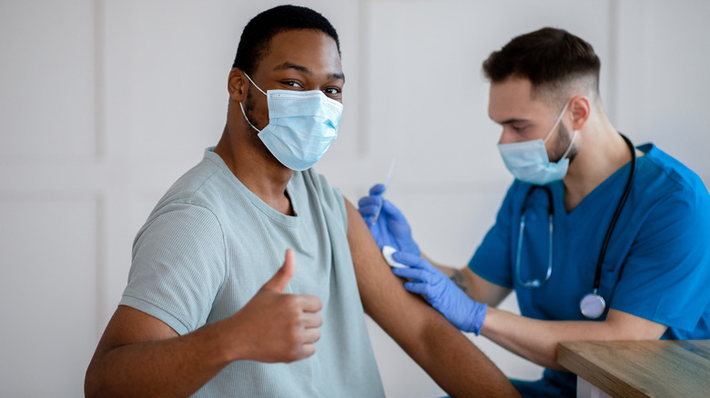 man receiving vaccine 
