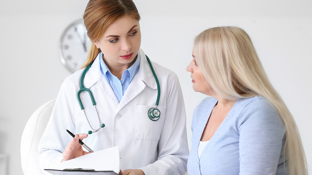 doctor talking to patient