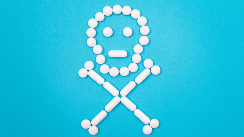 Skull and crossed bones made up of tablets