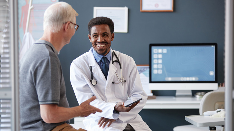 senior man at visit with doctor