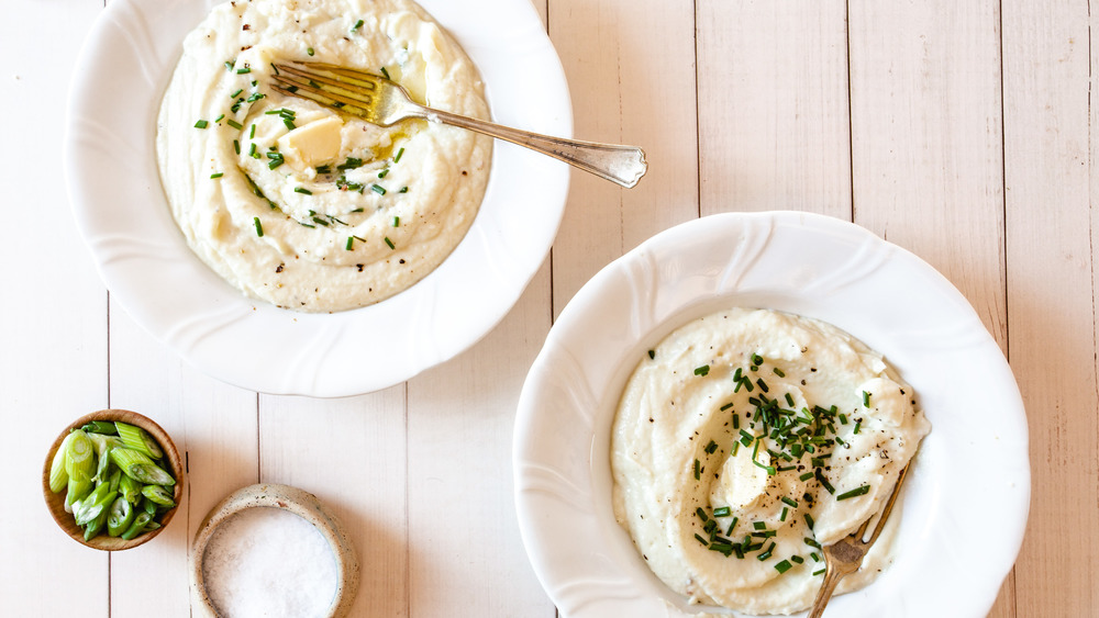 two bowls of mashed cauliflower