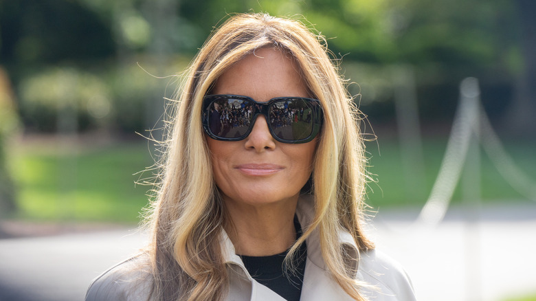 Melania Trump outside wearing sunglasses