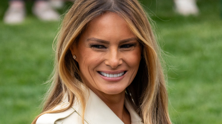 Melania Trump outdoors smiling