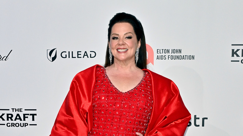 Melissa McCarthy wearing red dress