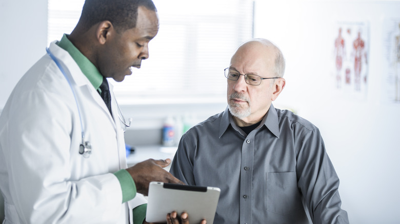 Doctor showing patient their test results