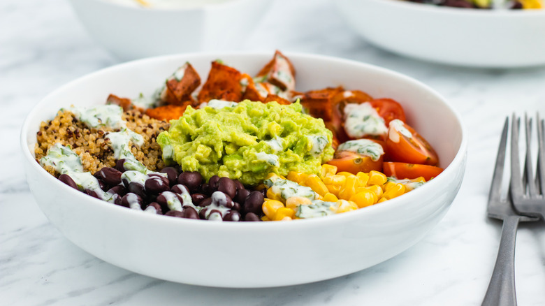 Buddha bowl on white countertop