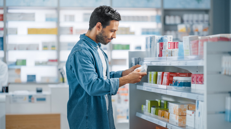 man shopping for OTC medications