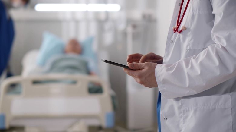 man in hospital bed